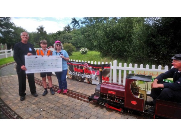 Left to right in the photo of the presentation:- John Houghton of HBOT IOM, Doug Quayle, Bridget Bolster